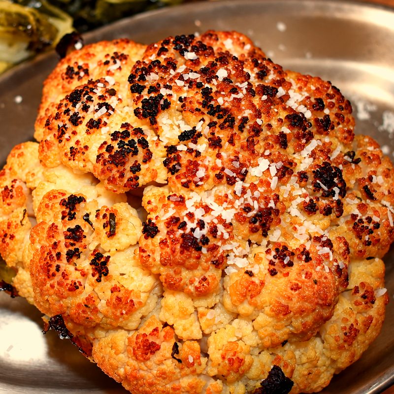 Whole roasted cauliflower, charred on top, for Sunday lunch at The Railway Inn