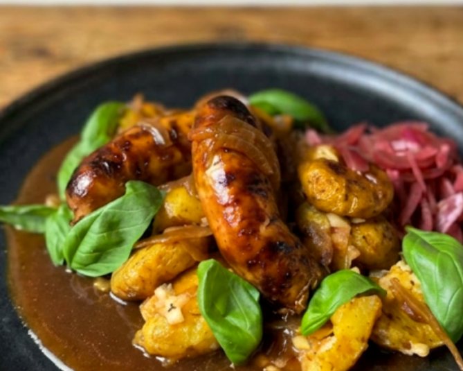 Glazed sausages with house-pickled red onion and fresh basil from the Light & Salt kitchen